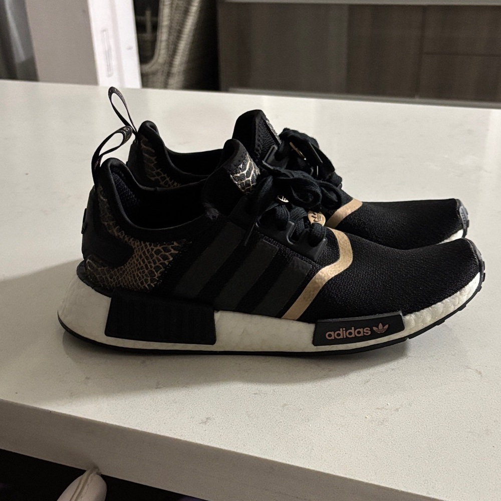 Adidas Black Sneakers with Gold Highlights